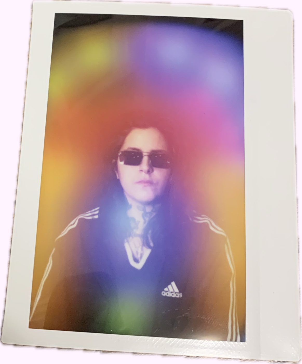 Aura portrait in a white frame, glowing orange, magenta and violet.